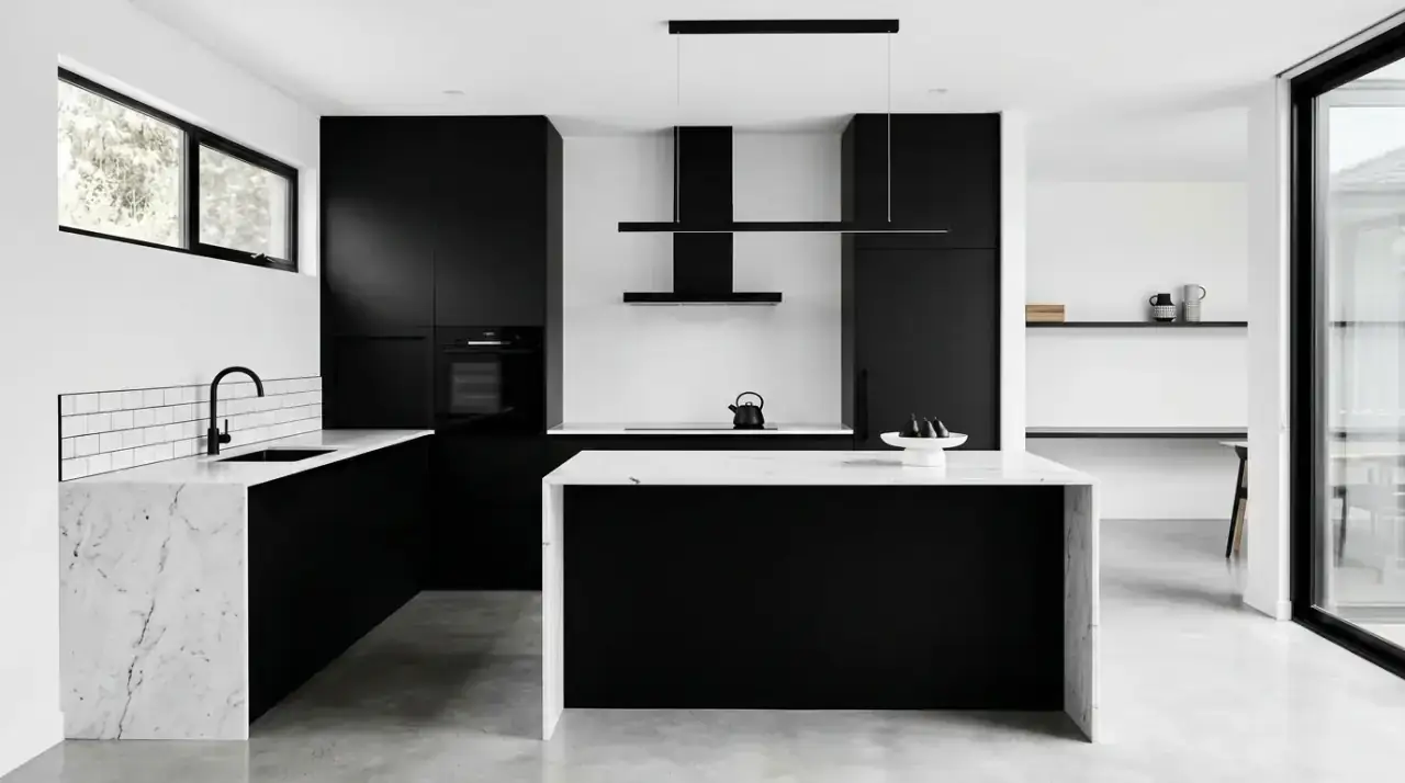 Integrated appliance minimalist kitchen. Seamless appliance panels preserving a clean kitchen wall line.